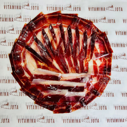 Detalle del corte a cuchillo de paleta ibérica de bellota 100%